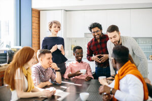 A group of employees enjoying their break in an office break room that has just been cleaned by a professional maid service in St. Charles, MO.