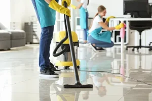 Golden Rule Cleaning & More—A professional maid service cleans and vacuums an office space in Saint Louis, MO.